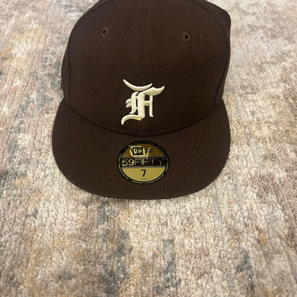 New Era Fear of God Cap. Brown with White Logo
